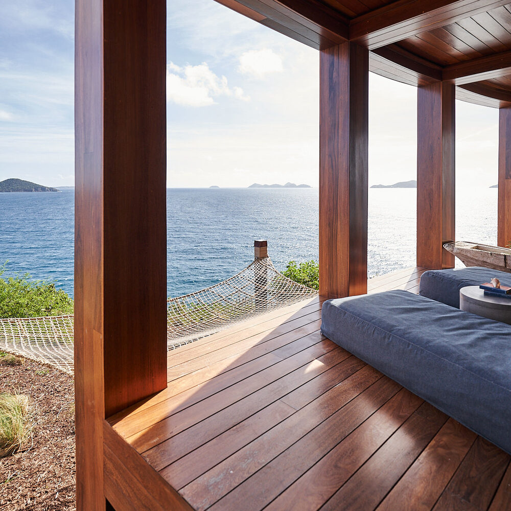 Gratitude — private cliffside terrace with hammock overlooking the Caribbean